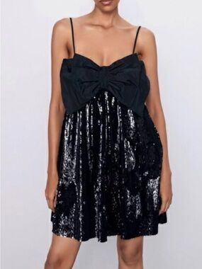 Zara Brand New Size L
Black Sequin Mini Dress with Bow Detail